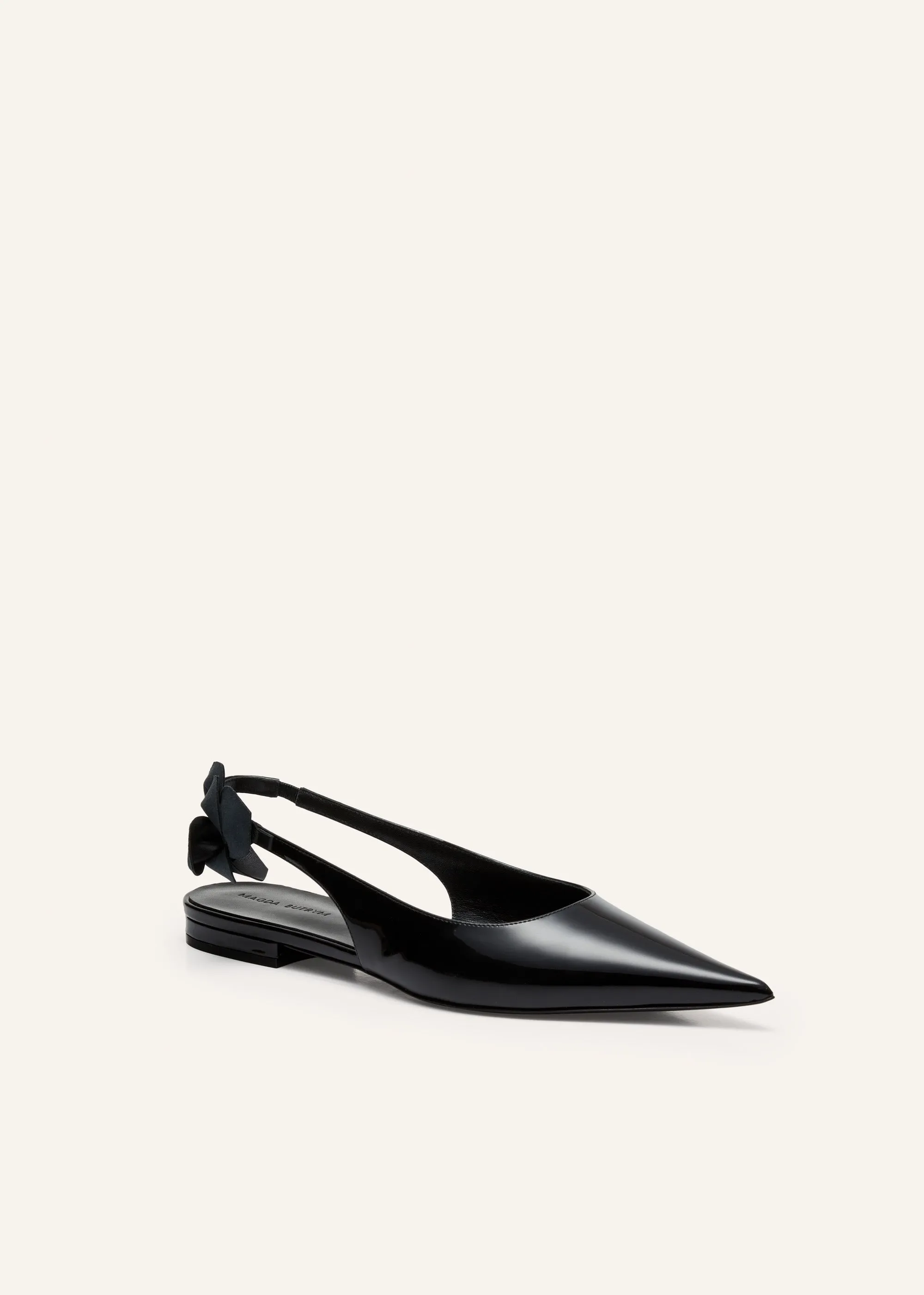 Slingback rose flats in black patent